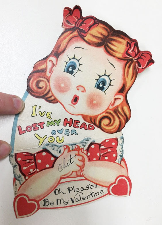 Vintage Valentine's Day card with a little girl on the front "I've lost my head over you, Oh please, be my Valentine"