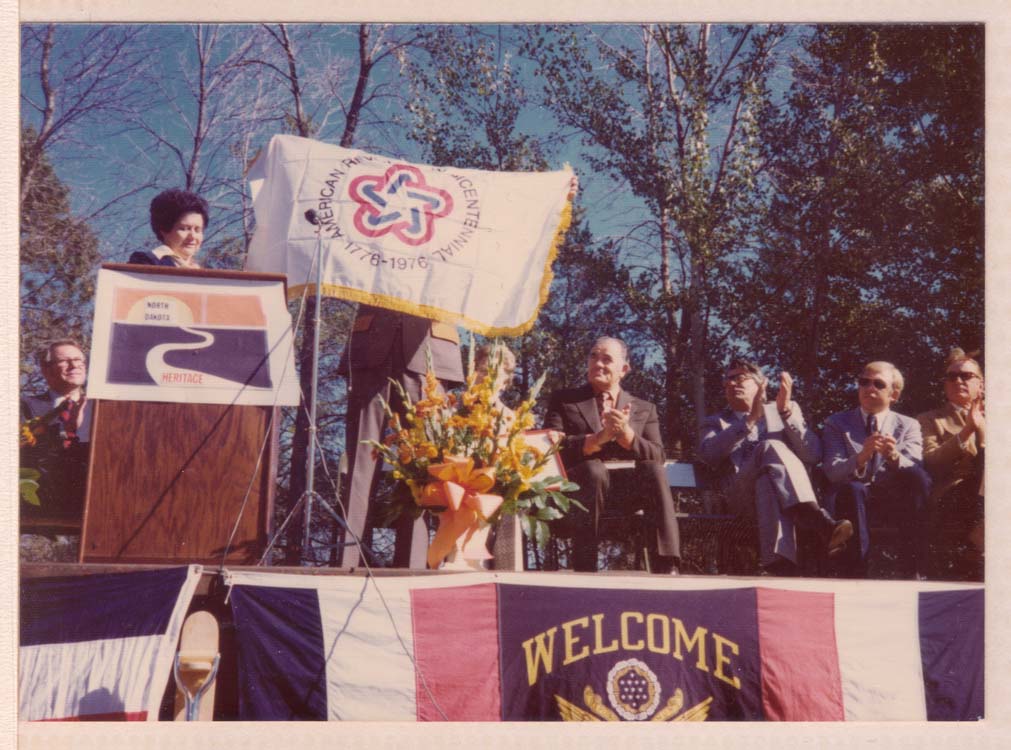 The Bicentennial flag is displayed at the groundbreaking ceremony of the ND Heritage Center, October 1976.