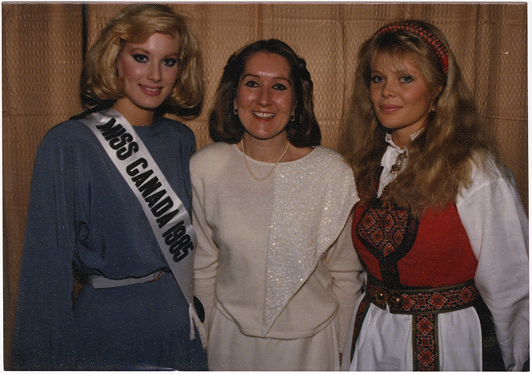 Attendees and festival staff dressed in traditional Scandinavian outfits jumped at the chance to take photographs with Miss Canada, 1985. SHSND SA 11762