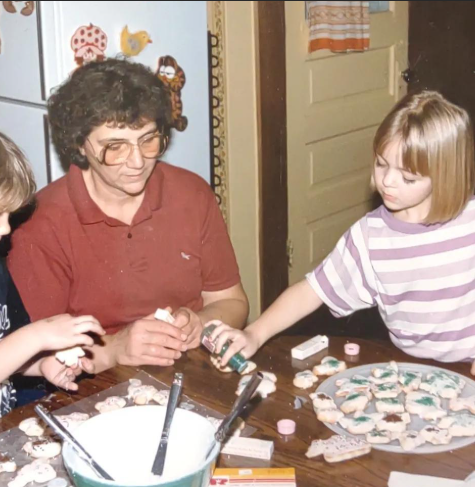 Author making christmas cookies w her grandmother.