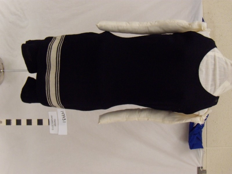 A navy-and-white wool swimsuit from about 1900. SHSND 14773.1