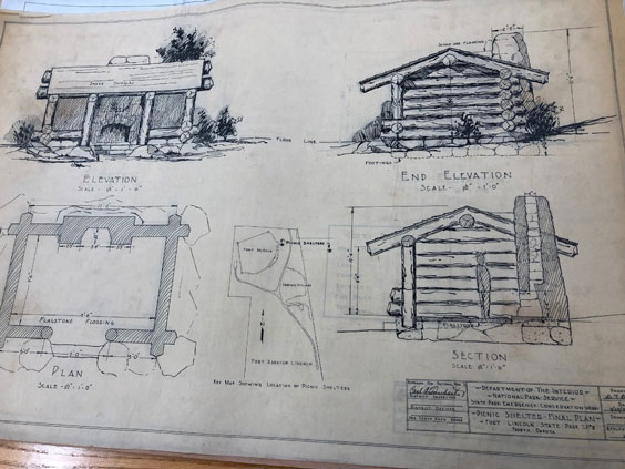 Drawings of a picnic shelter that resemble a log cabin