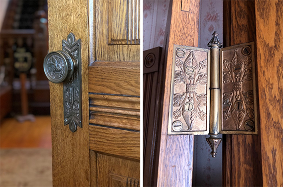 A door knob and hinge with very intricate leaf looking designs