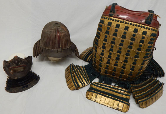 Samurai armor, including a helmet, chest plate, and face shield