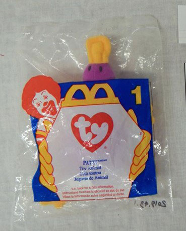 Plastic McDonalds TY Beanie Baby package with a yellow billed purple platypus