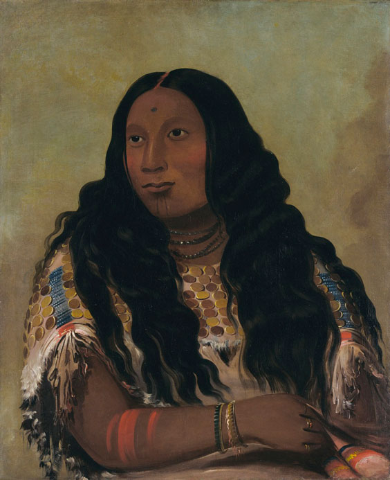 Portrait painting of Tchon-su-mons-ka by George Catlin. She has very long dark hair, dark skin, and is wearing a dress with many embellishments on the top