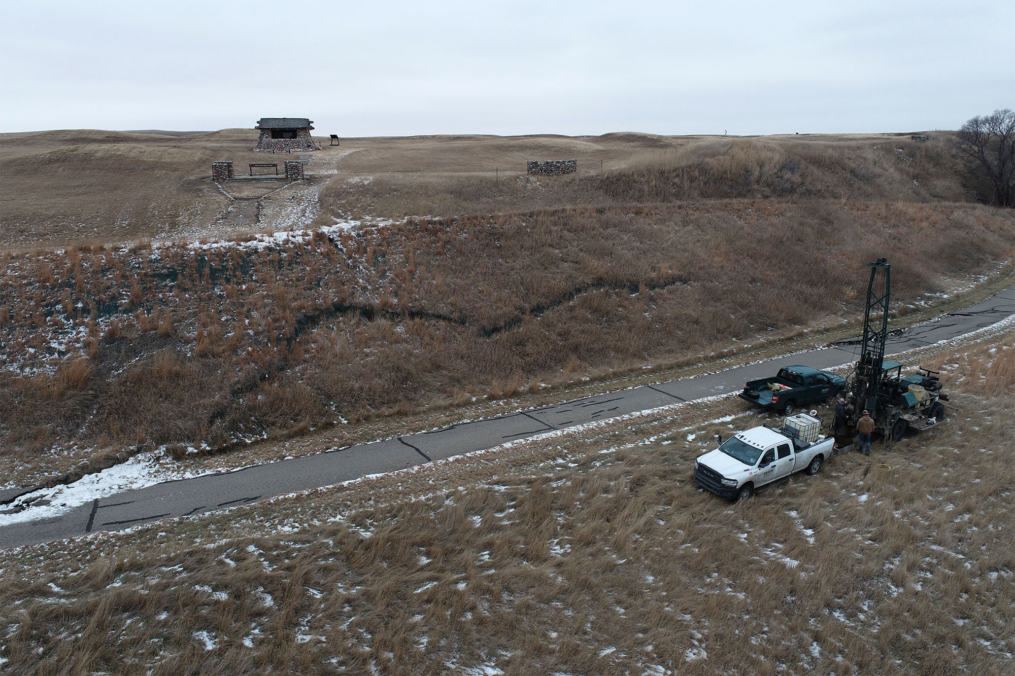 Major slumping cracks at Double Ditch and a geotechnical drilling rig are visible in this drone image
