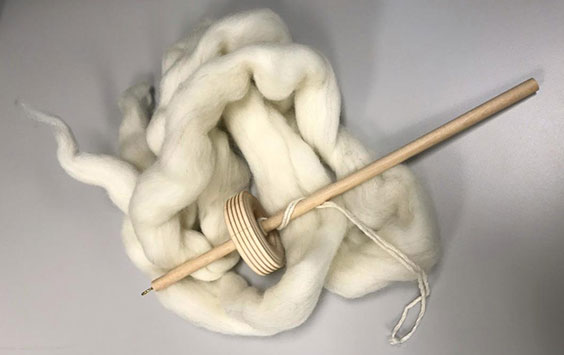 Drop spindle and wool roving