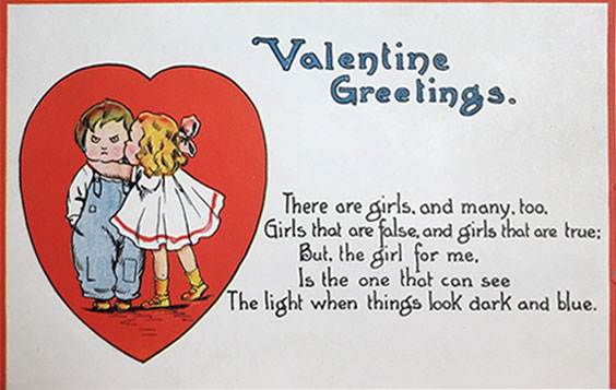 Vintage Valentine's Day card with a little girl and boy on the front