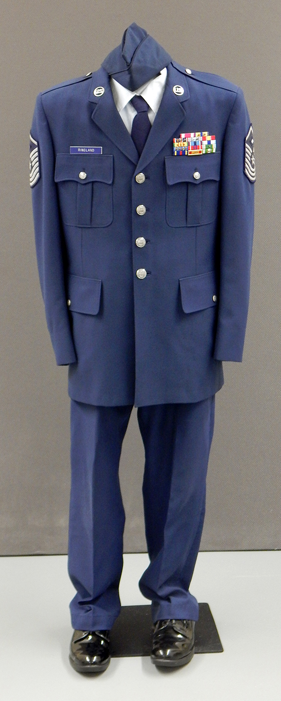 blue military suit with insignia