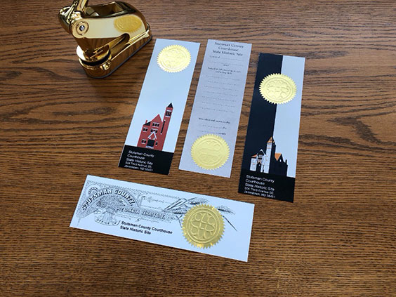 Emboss stamp and sample bookmarks