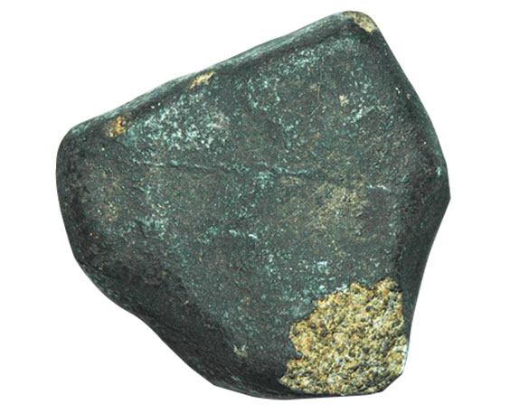 metorite rock, triangular in shape, dark grey speckled with tan