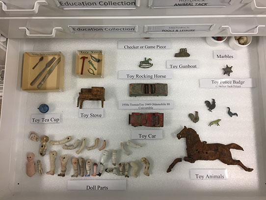 Drawer of objects relating to child's play and toys