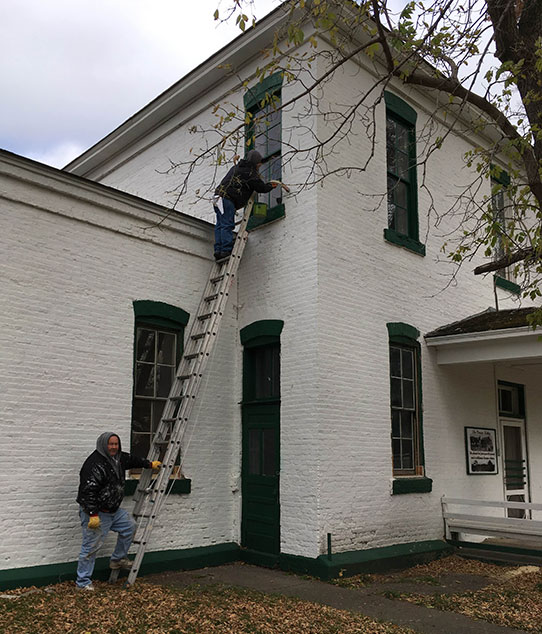 Exterior windows being painted