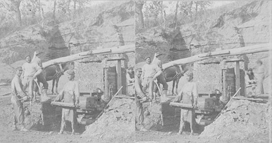 four men making bricks