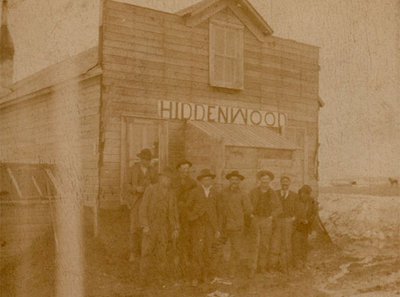Hiddenwood Mercantile and Hotel with people standing in front of the building