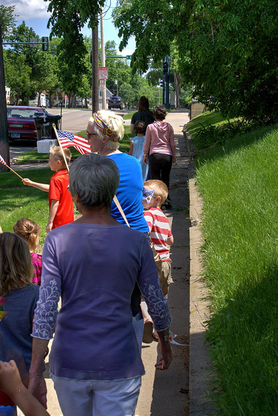 People participating in the Flag Day Parade