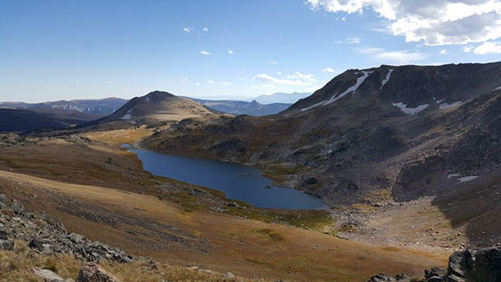 Montana's landscape with mountains and a body of water