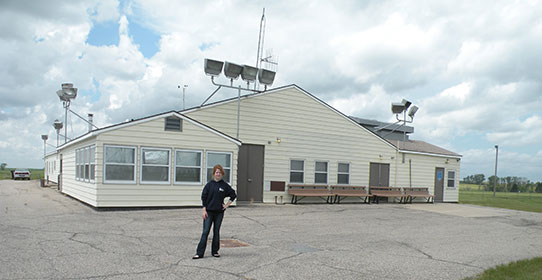 Standing outside the Ronald Reagan Minuteman Missile State Historic Site