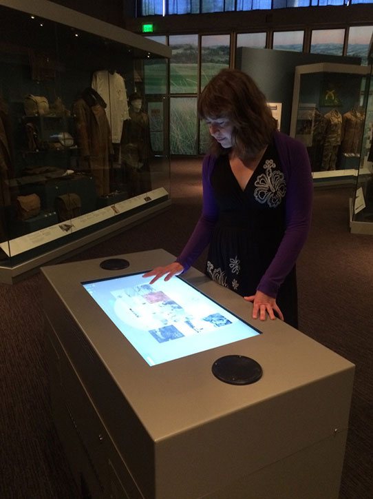 Sarah using touch table