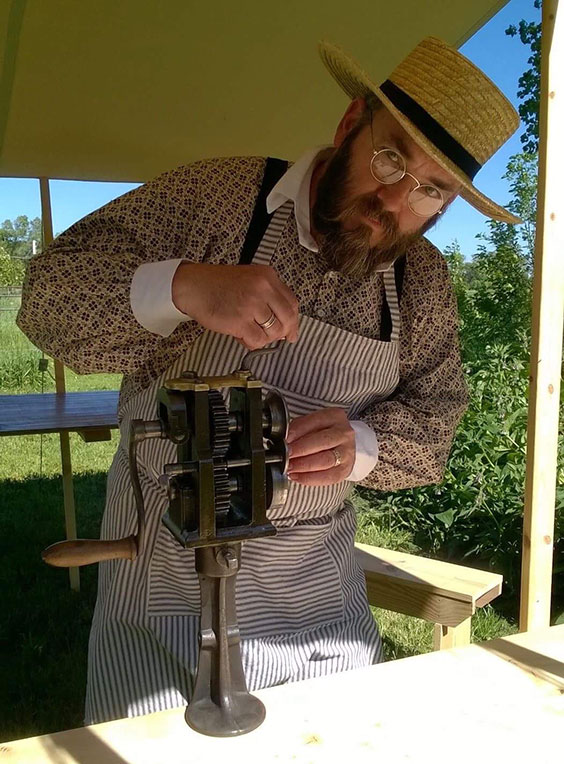 Tinsmith Karl Schmidt working