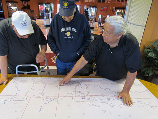 Men looking at map